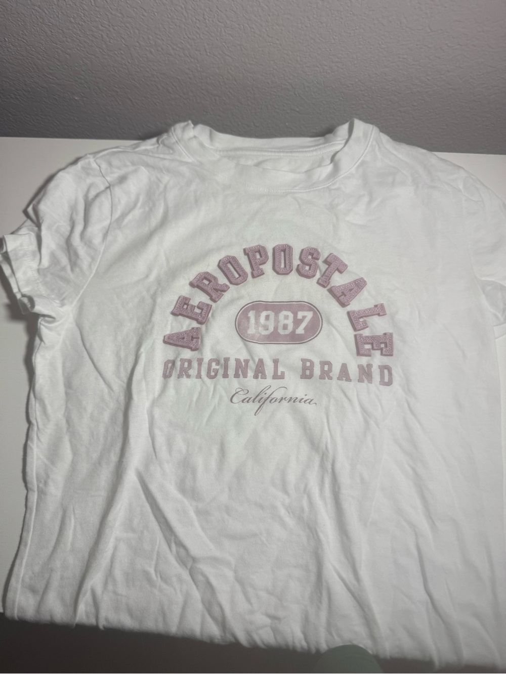 Aeropostale White Crew Tee with Light Pink Logo Graphic